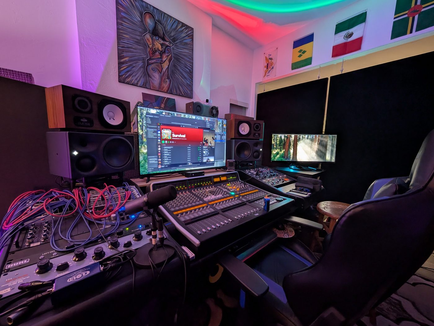 Flags and artwork on the studio wall at Echo's Miami location