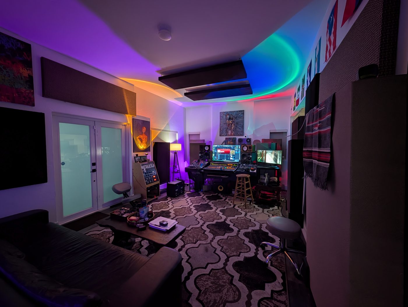 Echo's Miami recording studio control room with RGB ambient lighting and SSL Matrix console